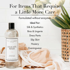 Pouring The Laundress Delicate Wash for precise dosing and no mess