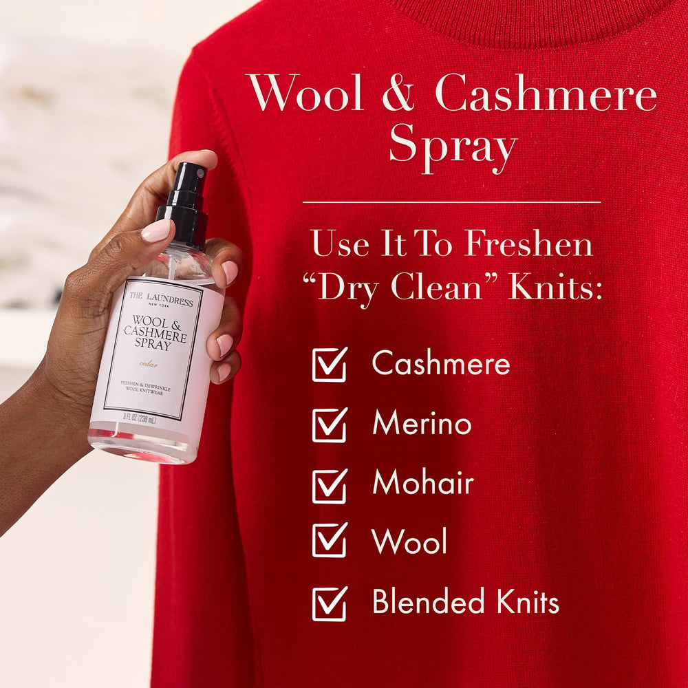 The Laundress bottle staged beside a folded wool scarf to show scale