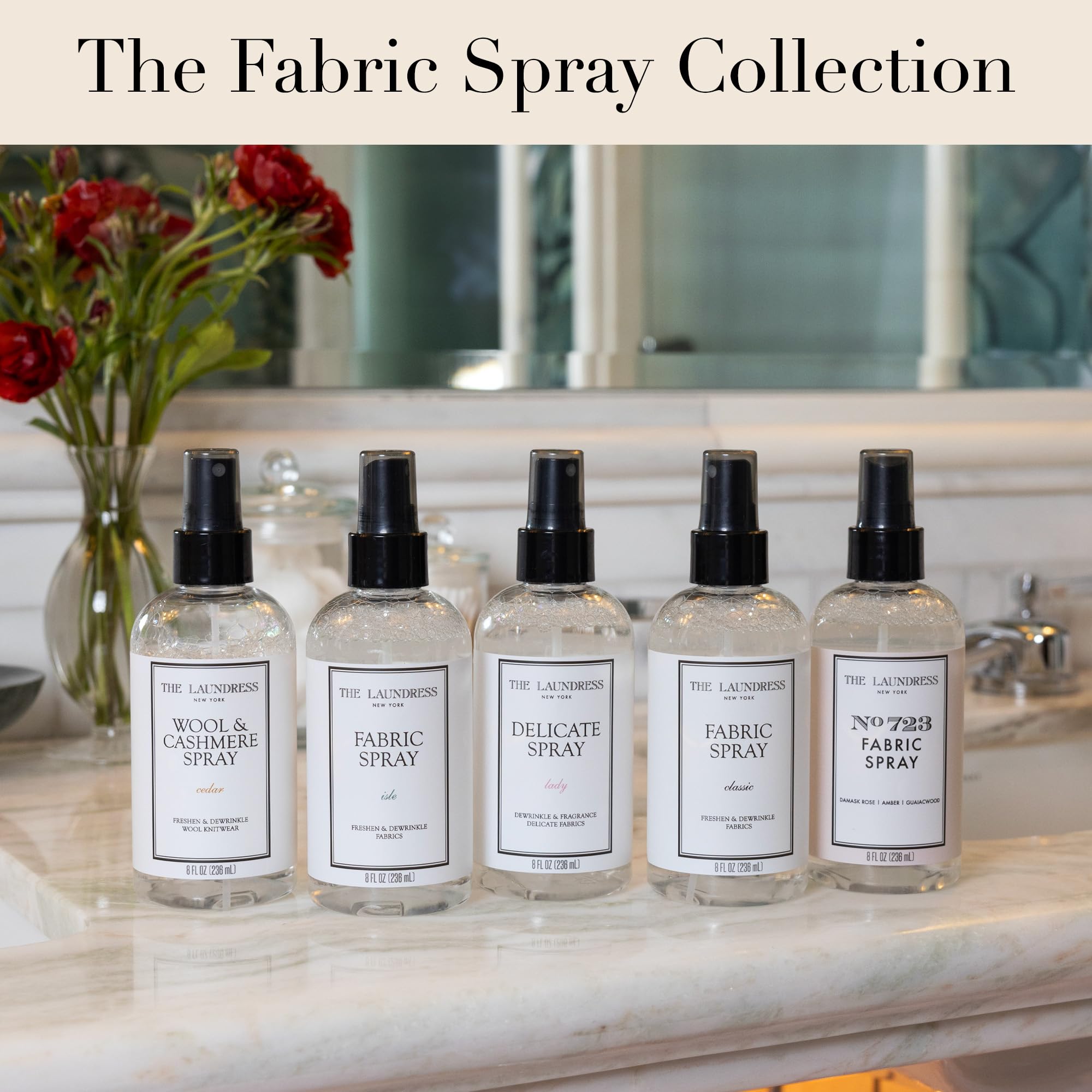 Styled cedar fragrance shot with The Laundress spray conveying warm, refined scent