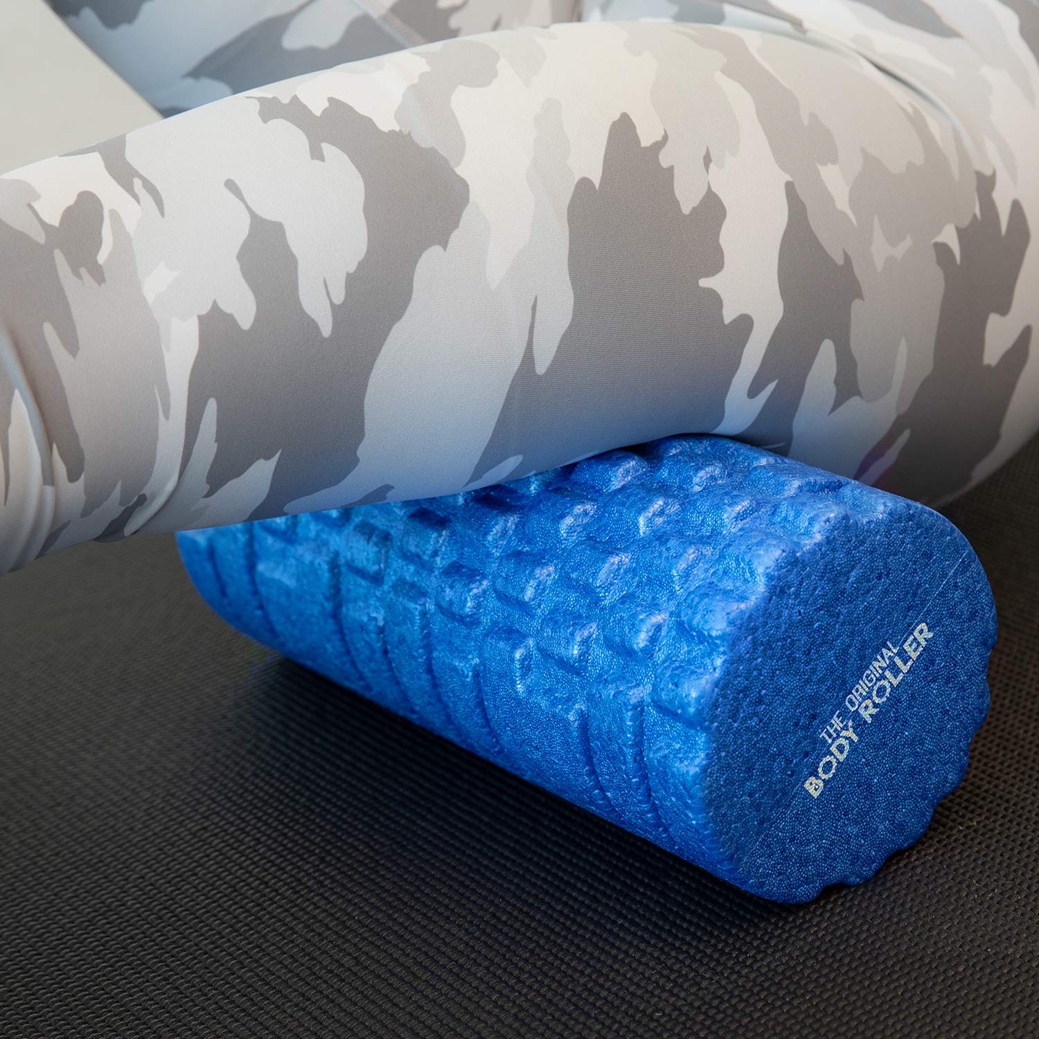 Packaged The Original Body Roller and accessories emphasizing portability and storage benefit