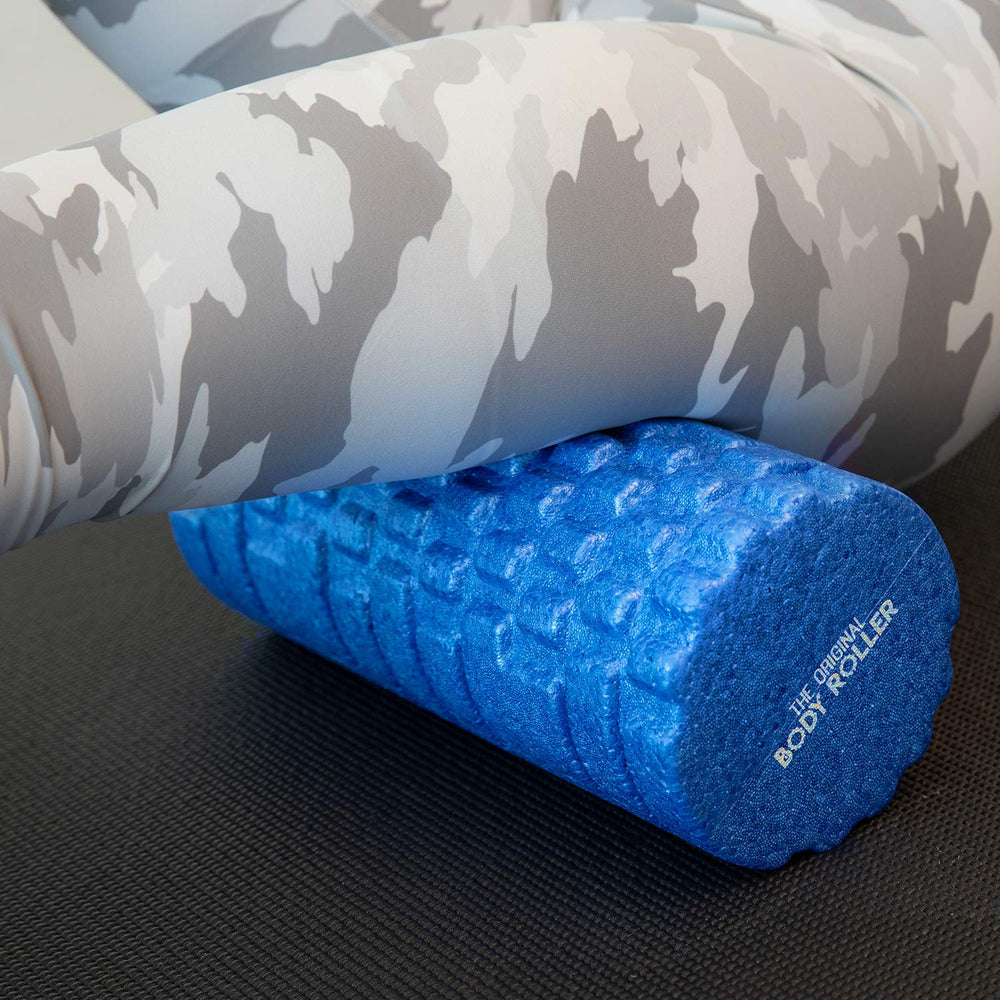 Packaged The Original Body Roller and accessories emphasizing portability and storage benefit