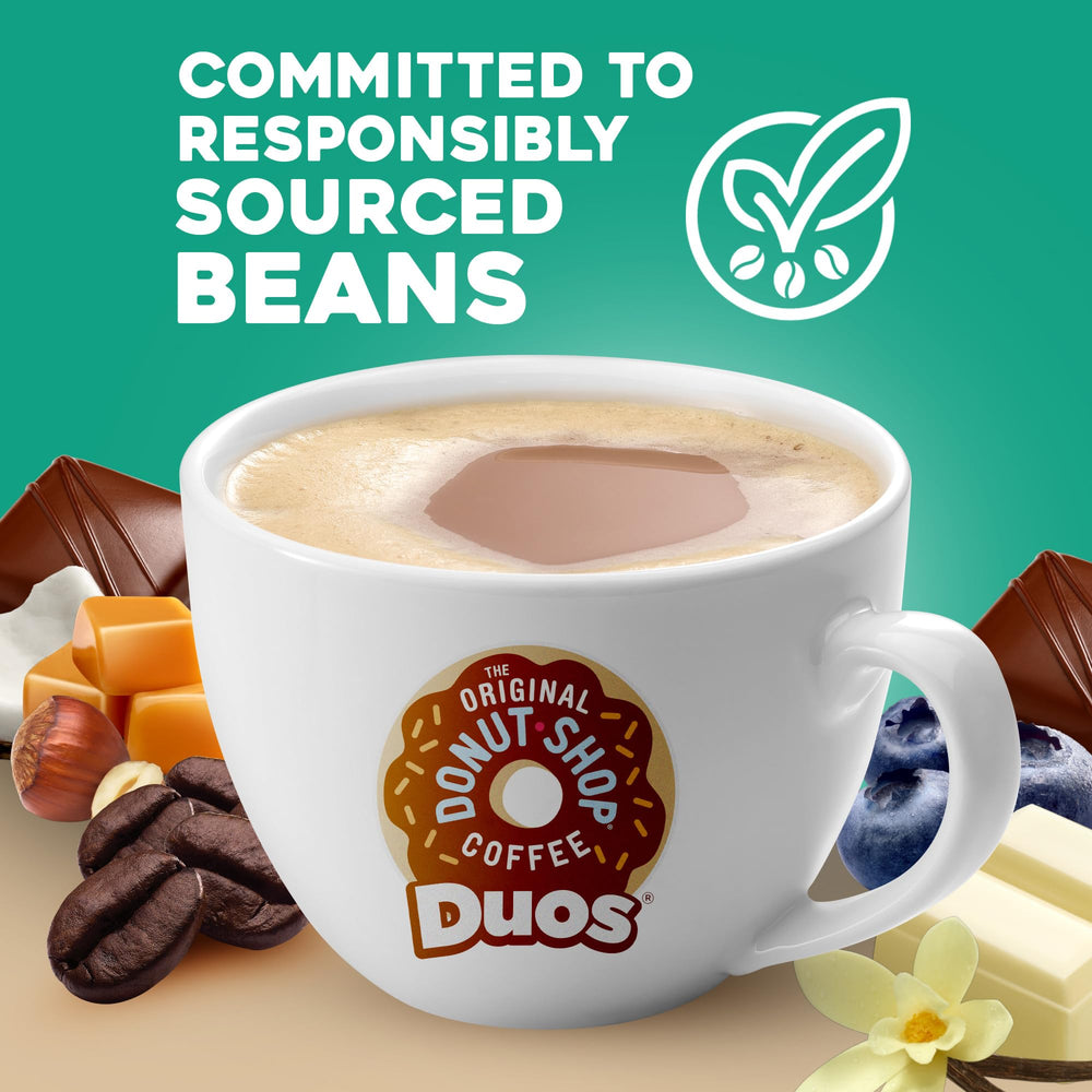 Cup receiving milk pour beside a pod from The Original Donut Shop showing flavor balance