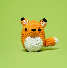 The Woobles yarn and crochet hook close-up showing easy-to-hold yarn benefit