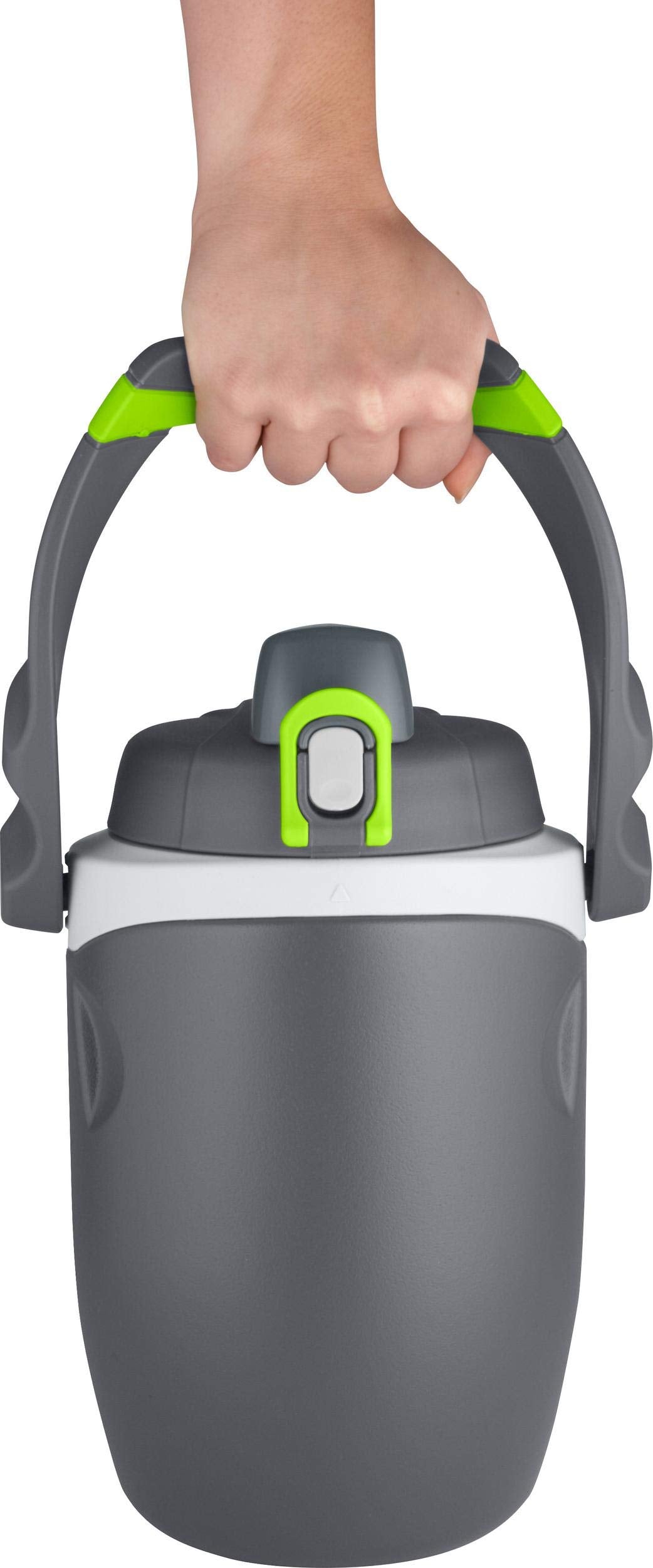 THERMOS bottle in use on a hiking trail offering easy access during activity