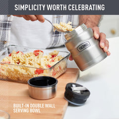 THERMOS held in hand illustrating 16oz scale and pocketable travel size