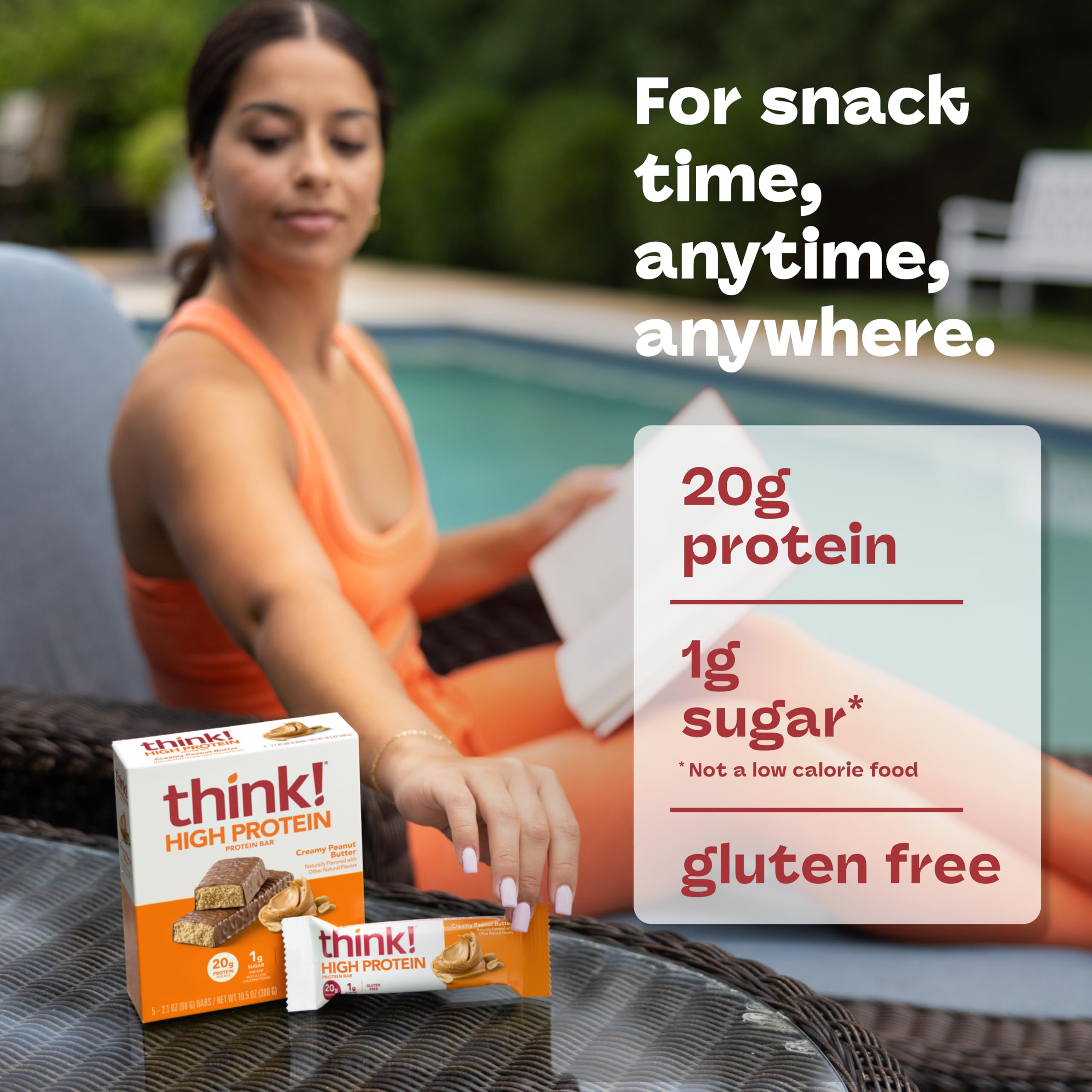 thinkThin bar in hand during travel demonstrating portable high-protein benefit