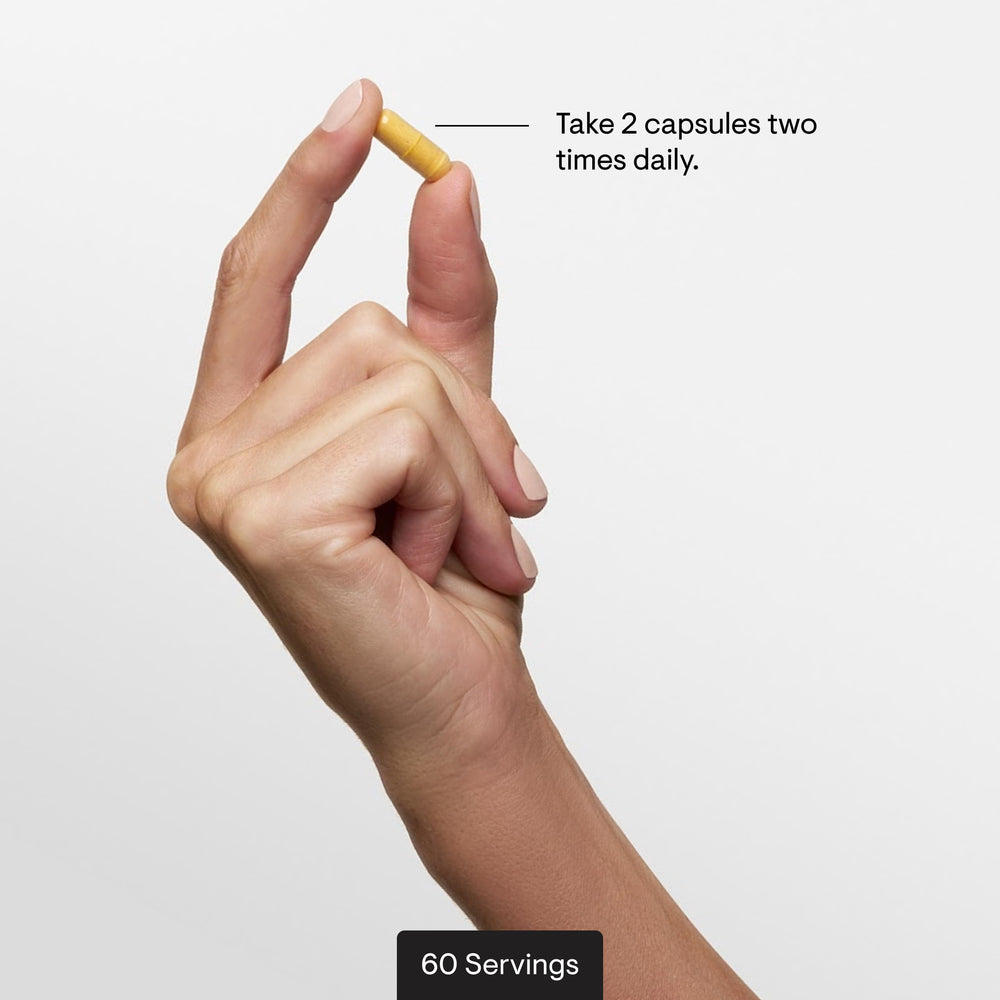 THORNE bottle in hand showing capsule count and portion size