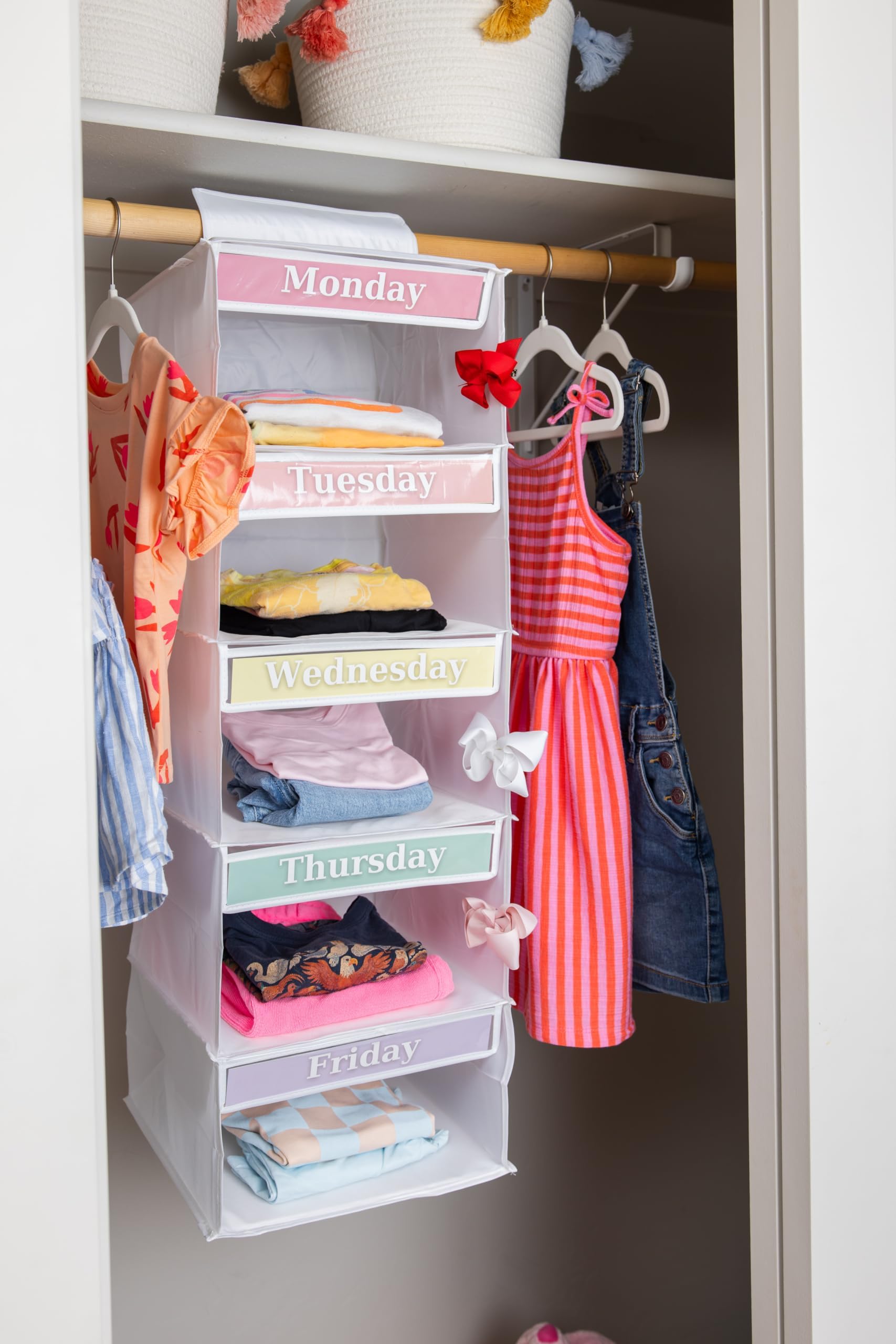Three Sweet Peas Co filled shelves with outfits ready to grab for faster mornings