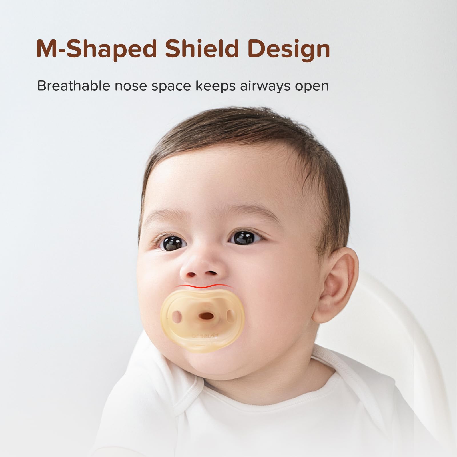 thyseed infant using pacifier demonstrates comfortable hold during soothing