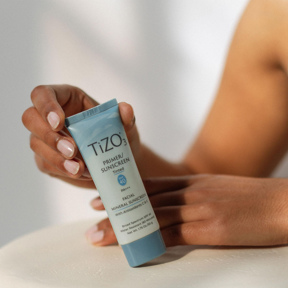 TIZO3 in hand illustrating coverage and real-size benefit