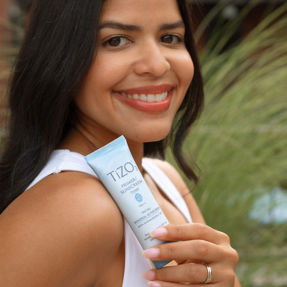 Person wearing TIZO3 outdoors showing sun protection benefit