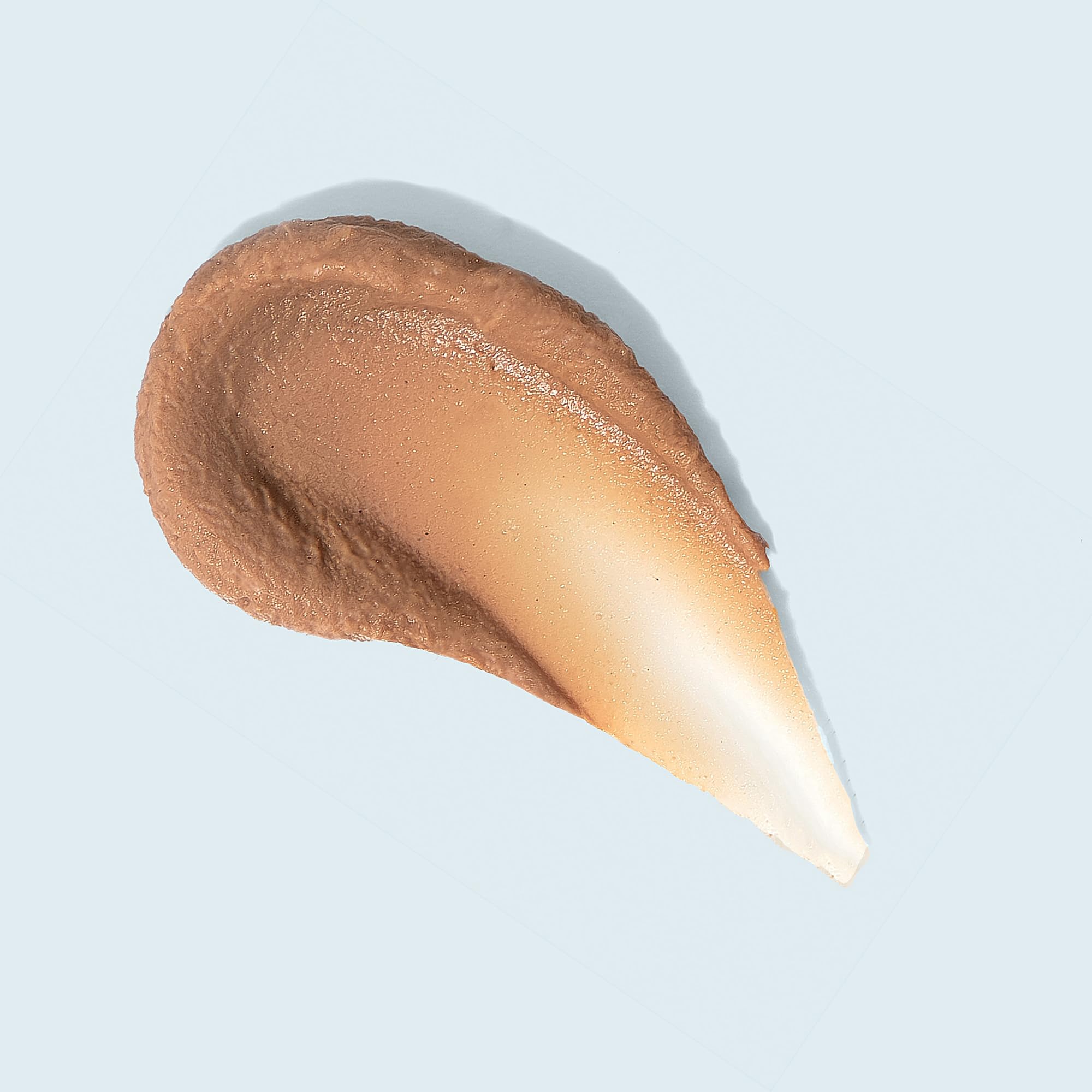 TIZO3 texture swatch close-up showing blendable silky matte benefit