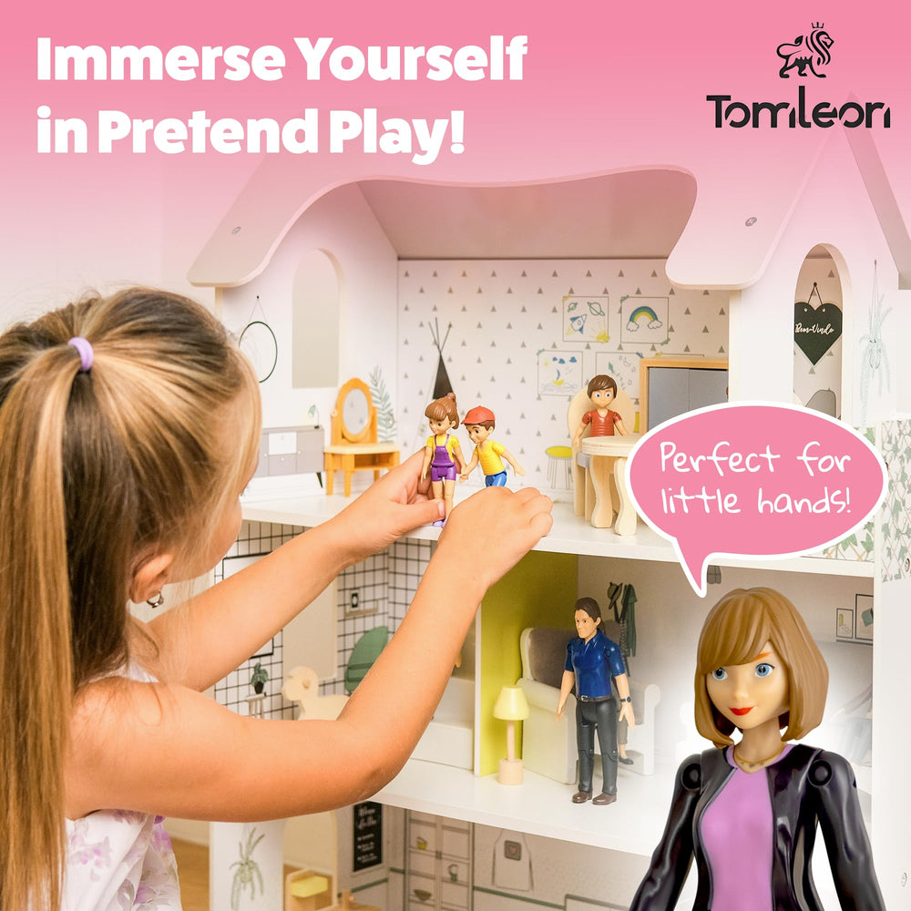 TOMLEON baby girl held in hand showing compact dollhouse scale