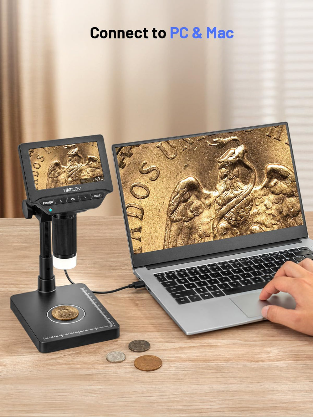 TOMLOV connected to laptop via USB enabling live larger-screen viewing