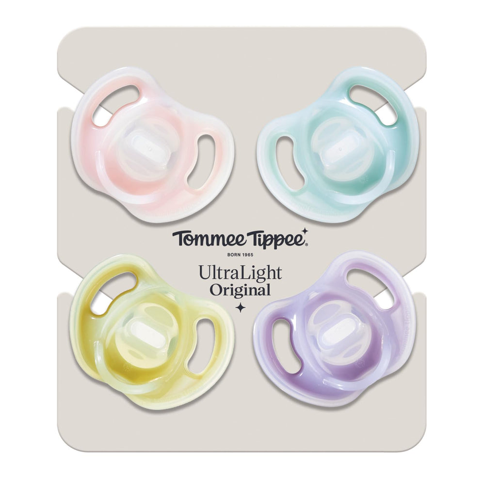 Tommee Tippee pacifier clipped to stroller showcasing portability and on-the-go use