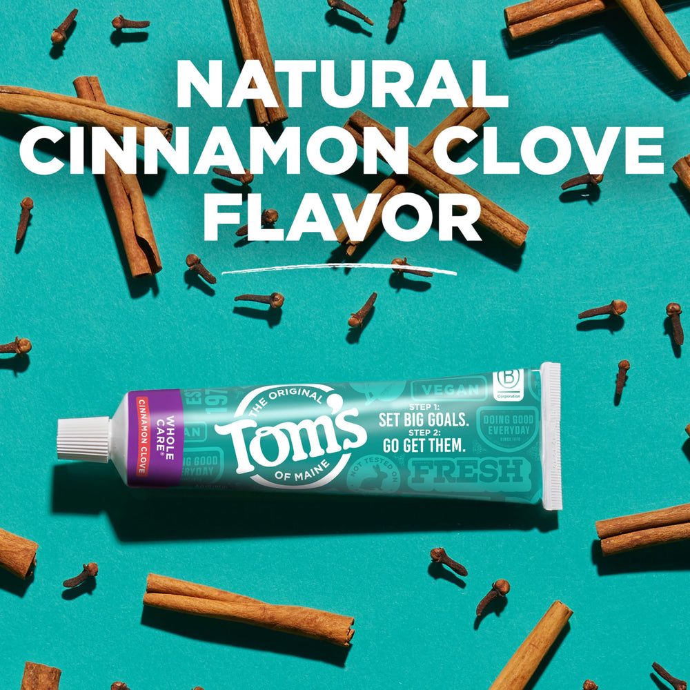 Tom's of Maine tube held in hand showing 4 oz size and portability