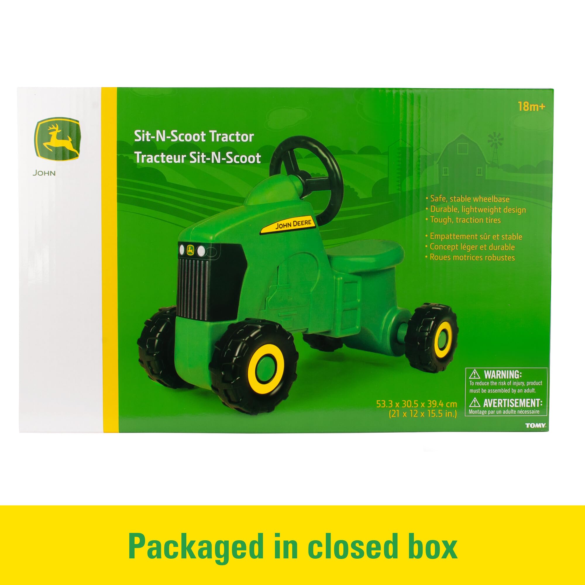 TOMY John Deere in yard lifestyle image showing outdoor play and active fun