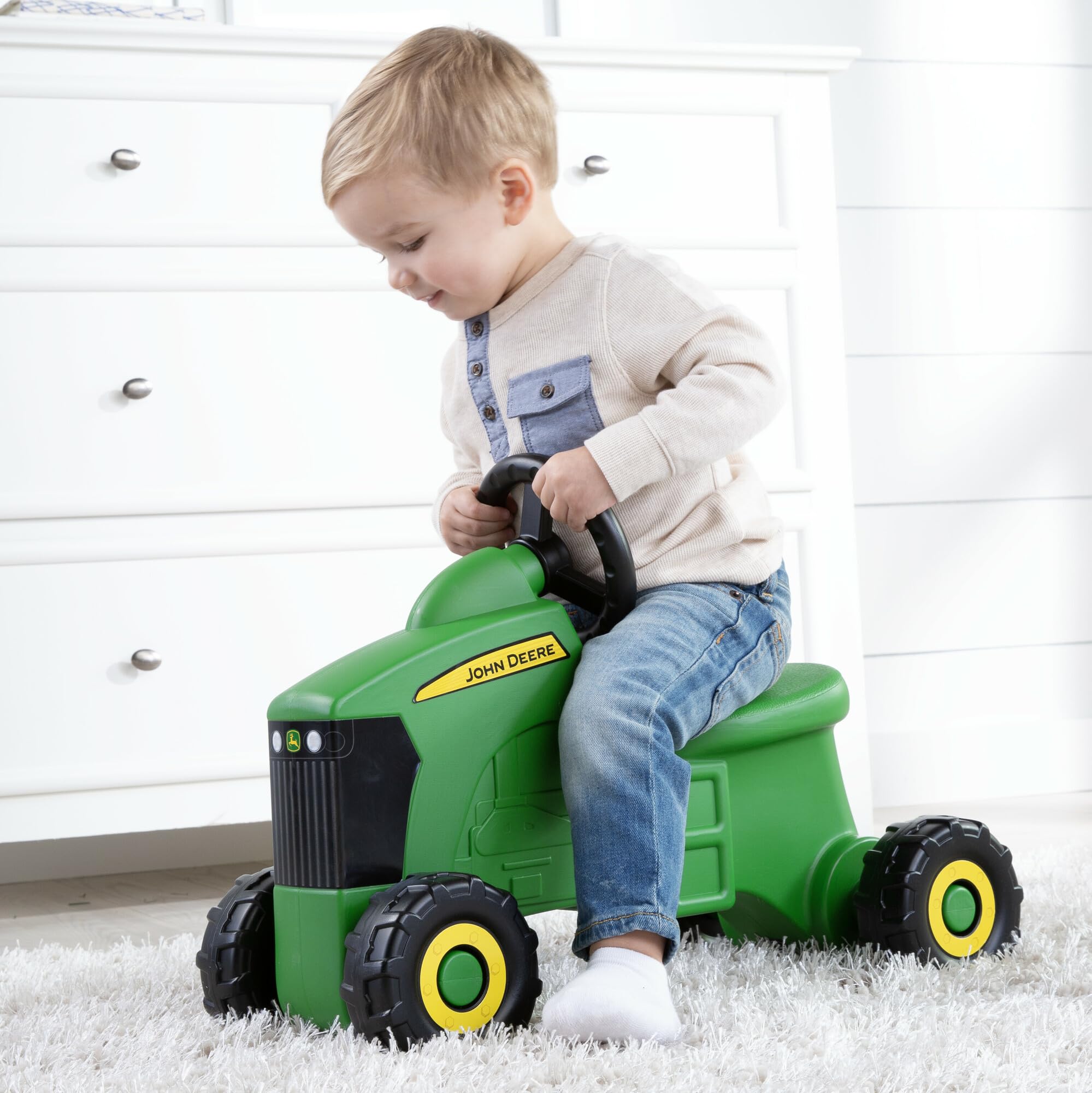 TOMY John Deere side profile highlighting compact lightweight frame for easy maneuvering