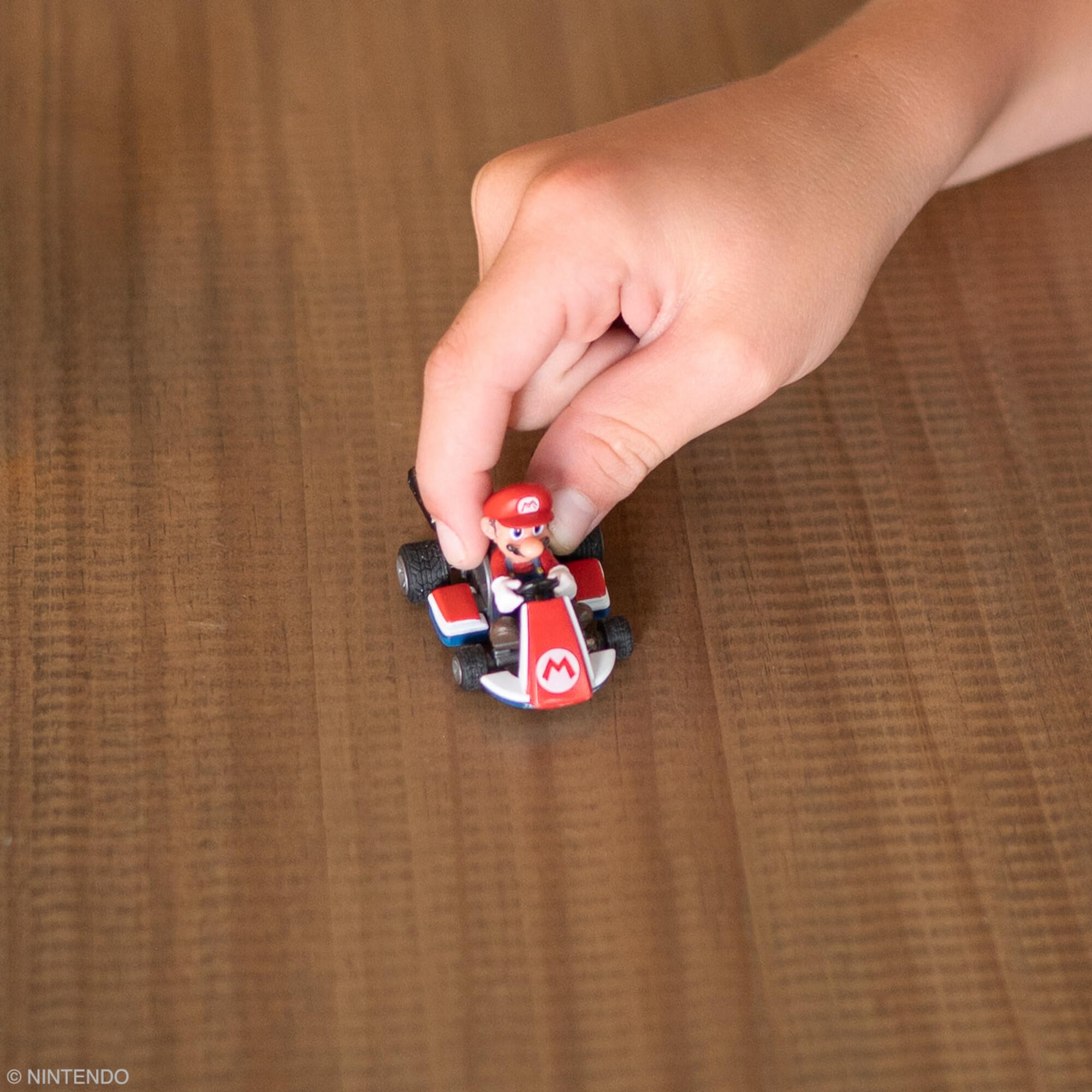 TOMY multiple racers racing on tabletop for instant competitive fun