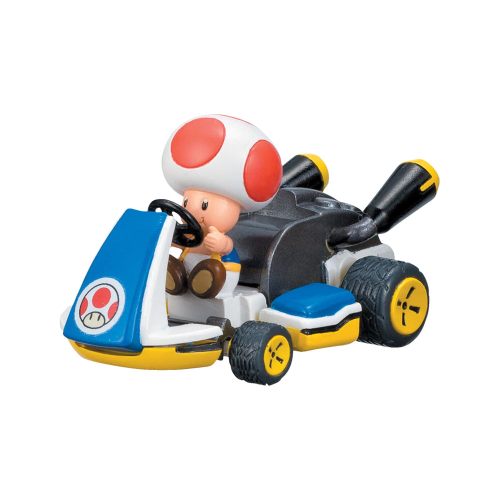 TOMY racer held in hand demonstrating compact size and portability