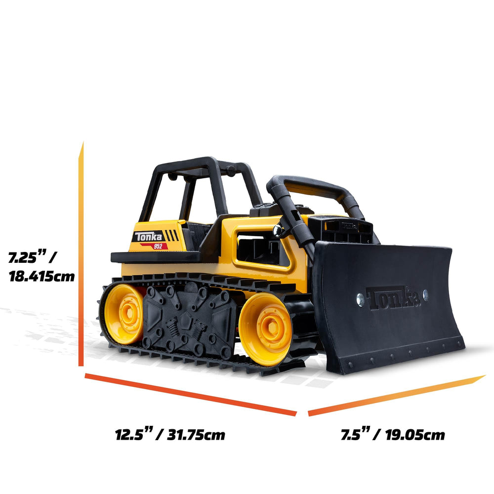 Tonka bulldozer in sandplay demonstrating outdoor play resistance