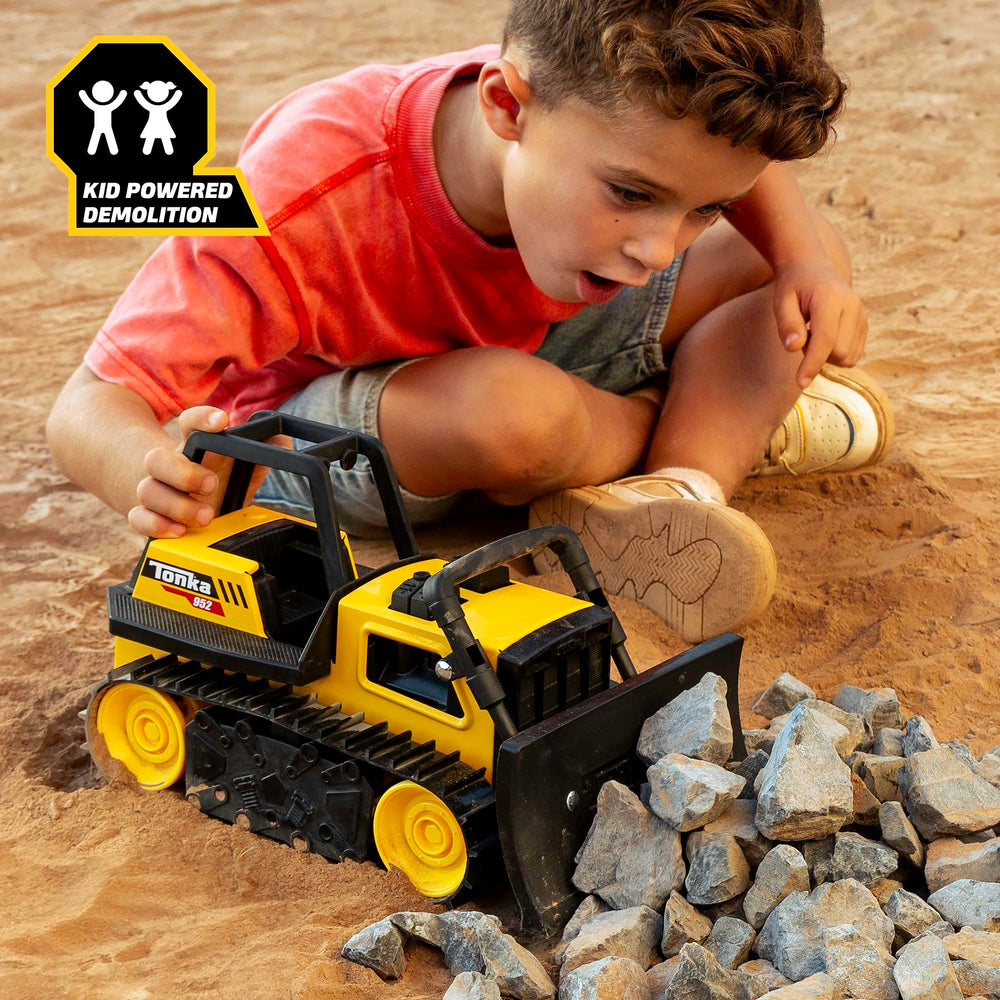 Tonka bulldozer scaled with hand to show size for toddlers