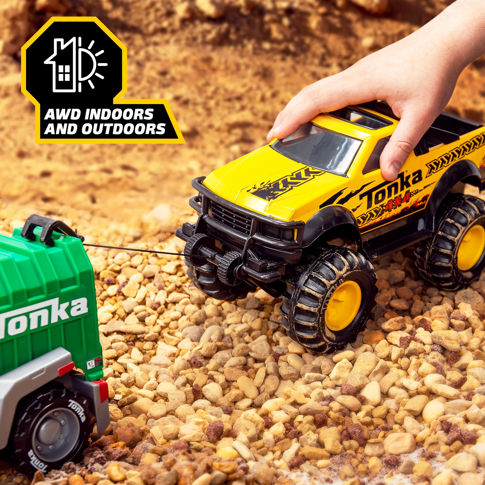 Tonka in sandbox during play showing outdoor ruggedness benefit
