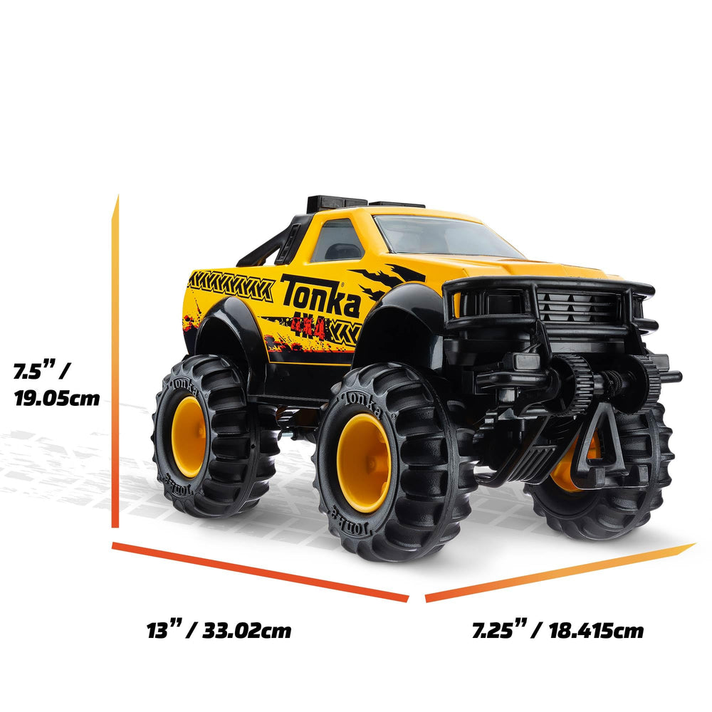 Tonka truck next to child hand showing scale and safe size benefit