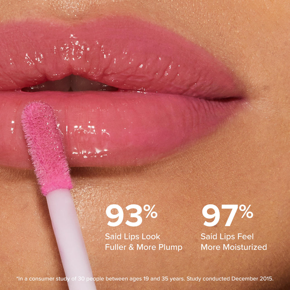 Too Faced applied on lips during application showing visible fullness and shine