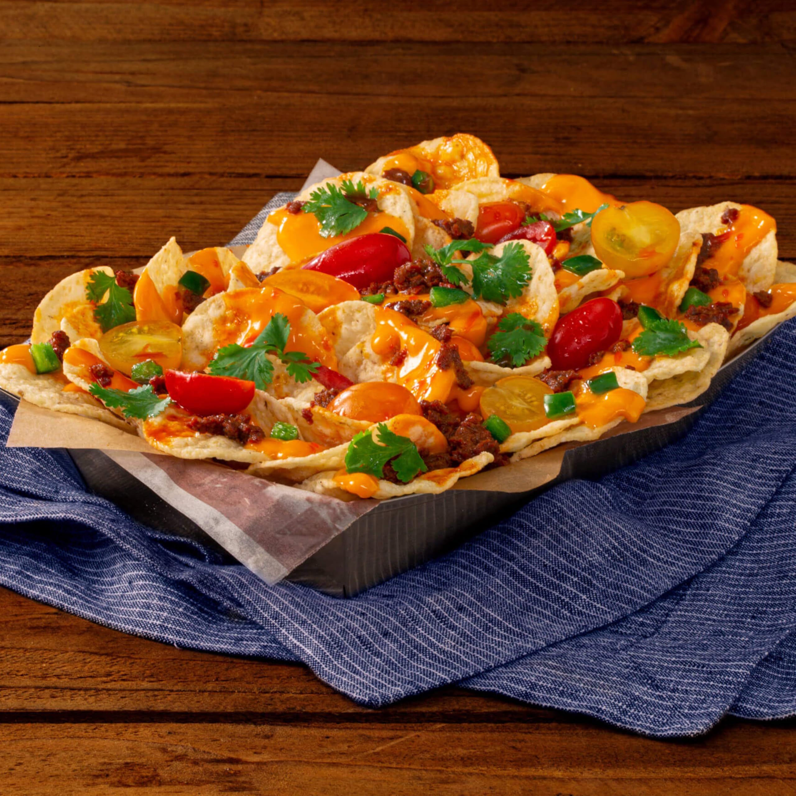 Close-up of Tostitos product label and nutrition facts, clear ingredient info