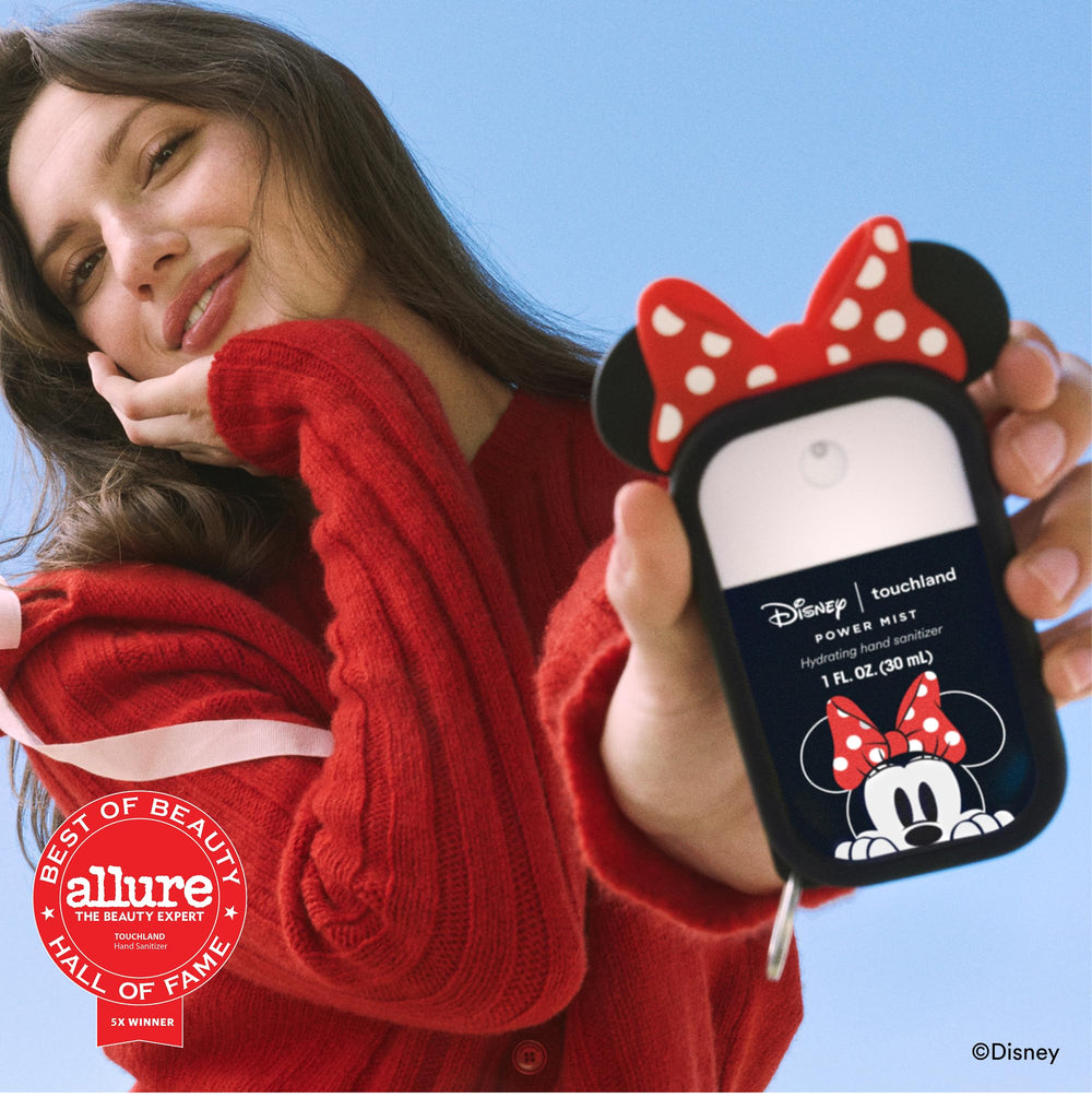 Touchland Minnie inside a purse lifestyle shot showing easy-access and spill protection
