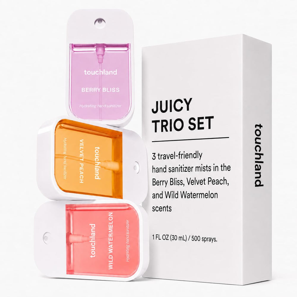 Touchland Velvet Peach mist spraying onto hand showing hydrating, non-sticky finish