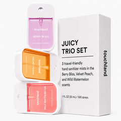 Touchland Velvet Peach mist spraying onto hand showing hydrating, non-sticky finish