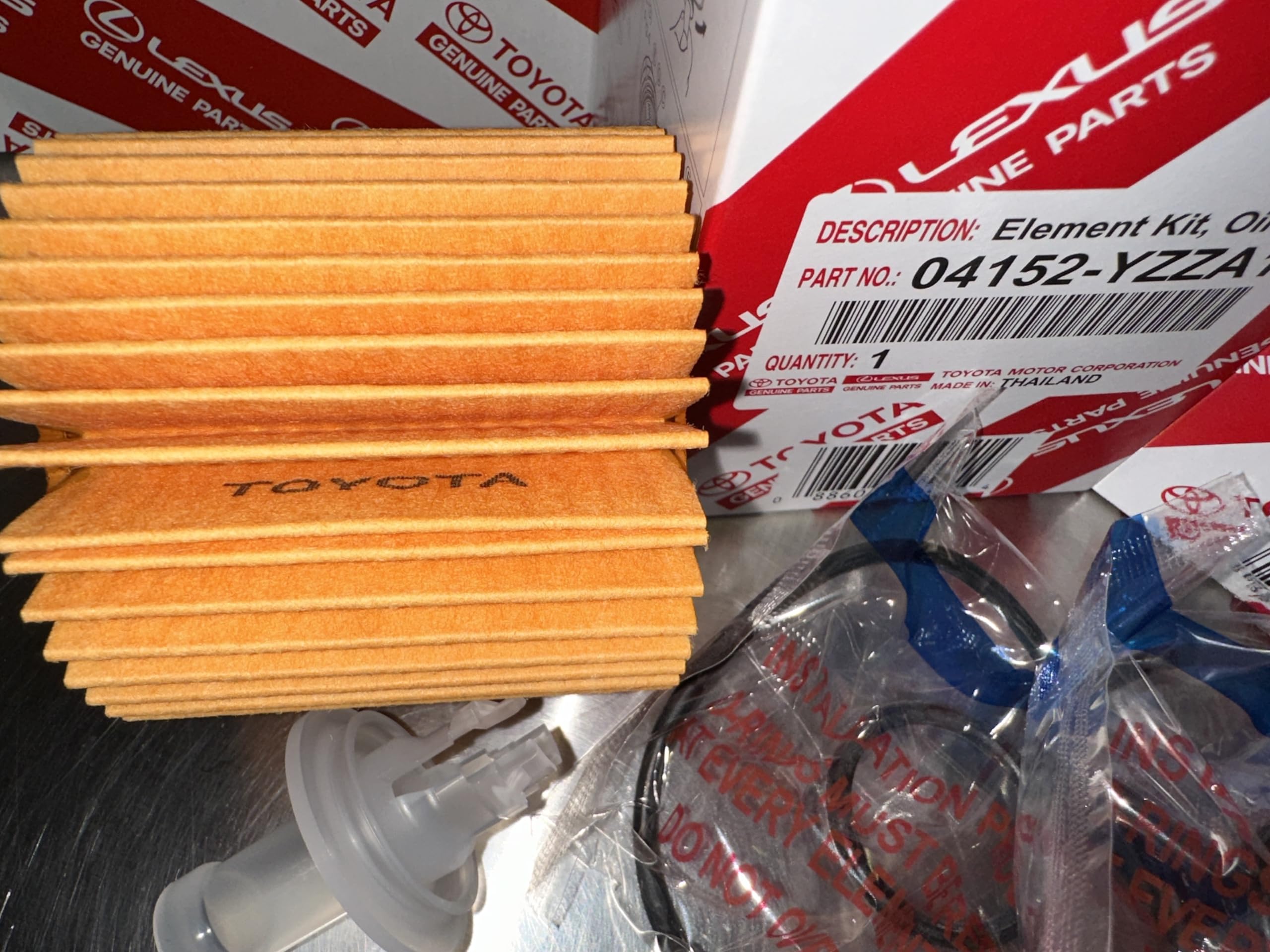 Toyota replaceable element close-up of filter media showing contaminant capture benefit