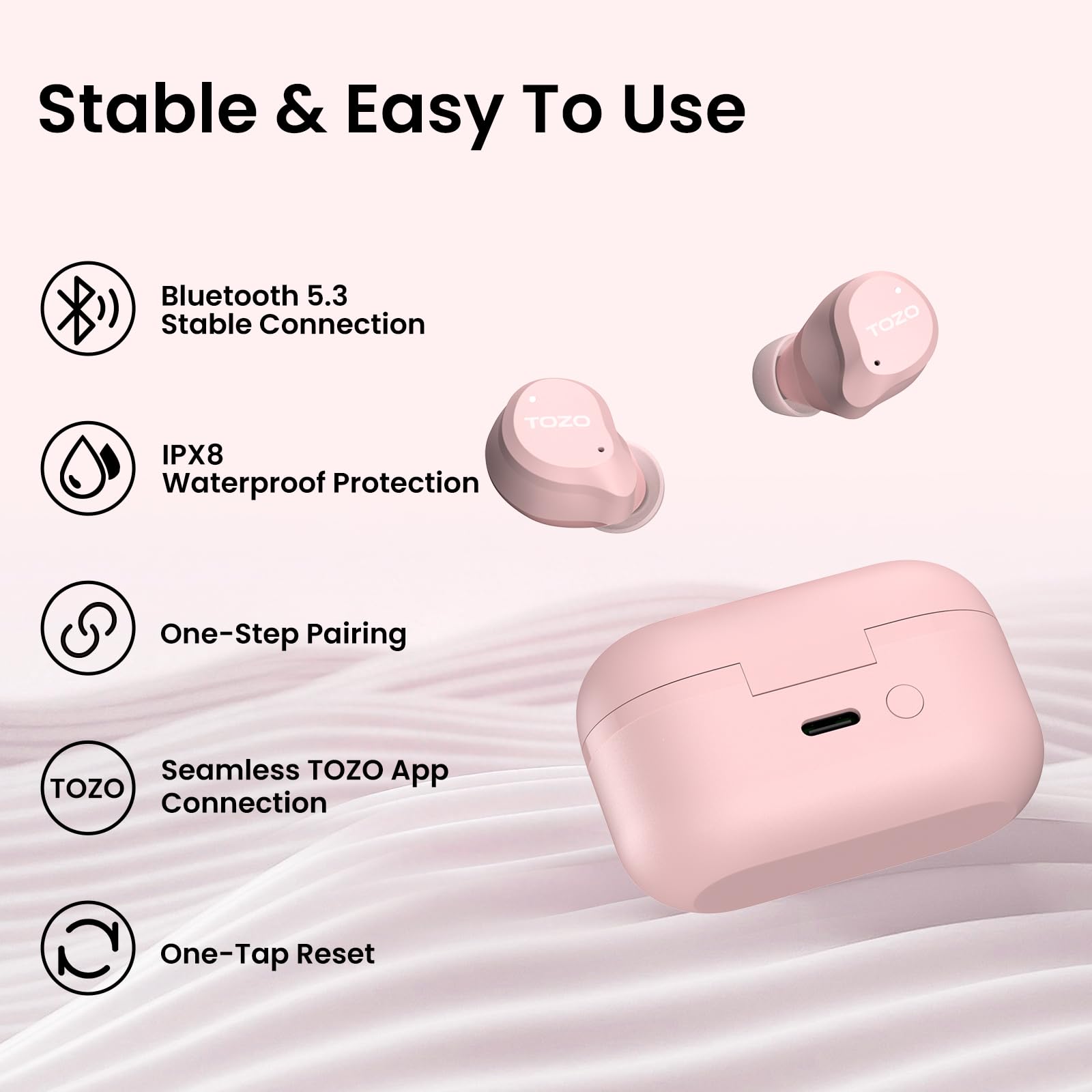TOZO NC9 with water droplets to illustrate IPX8 water resistance and active lifestyle