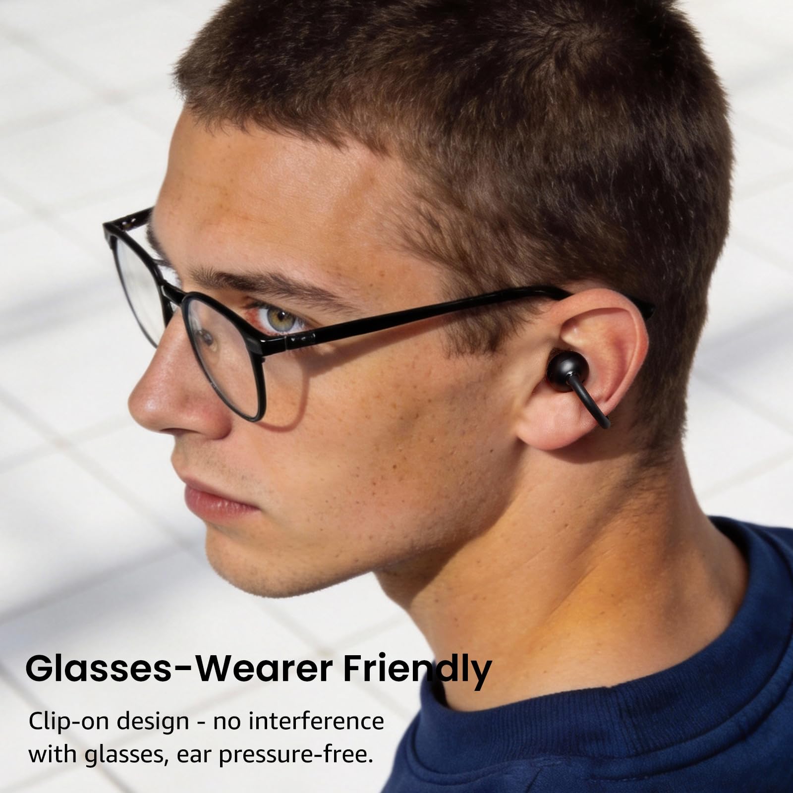 TOZO OpenEarRing seated with glasses, profile shows no interference with frames