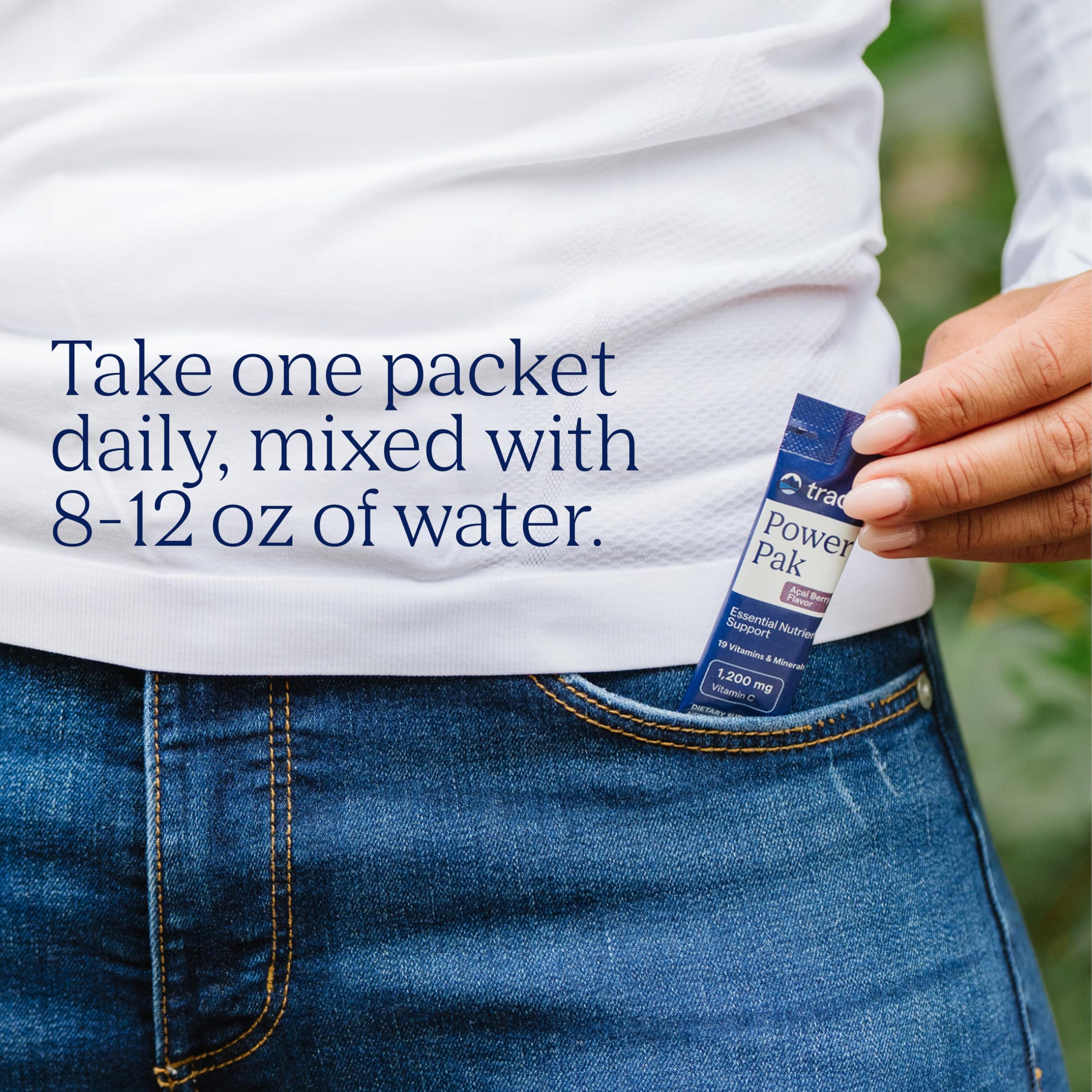Trace Minerals packet held in hand showing compact size for on-the-go convenience