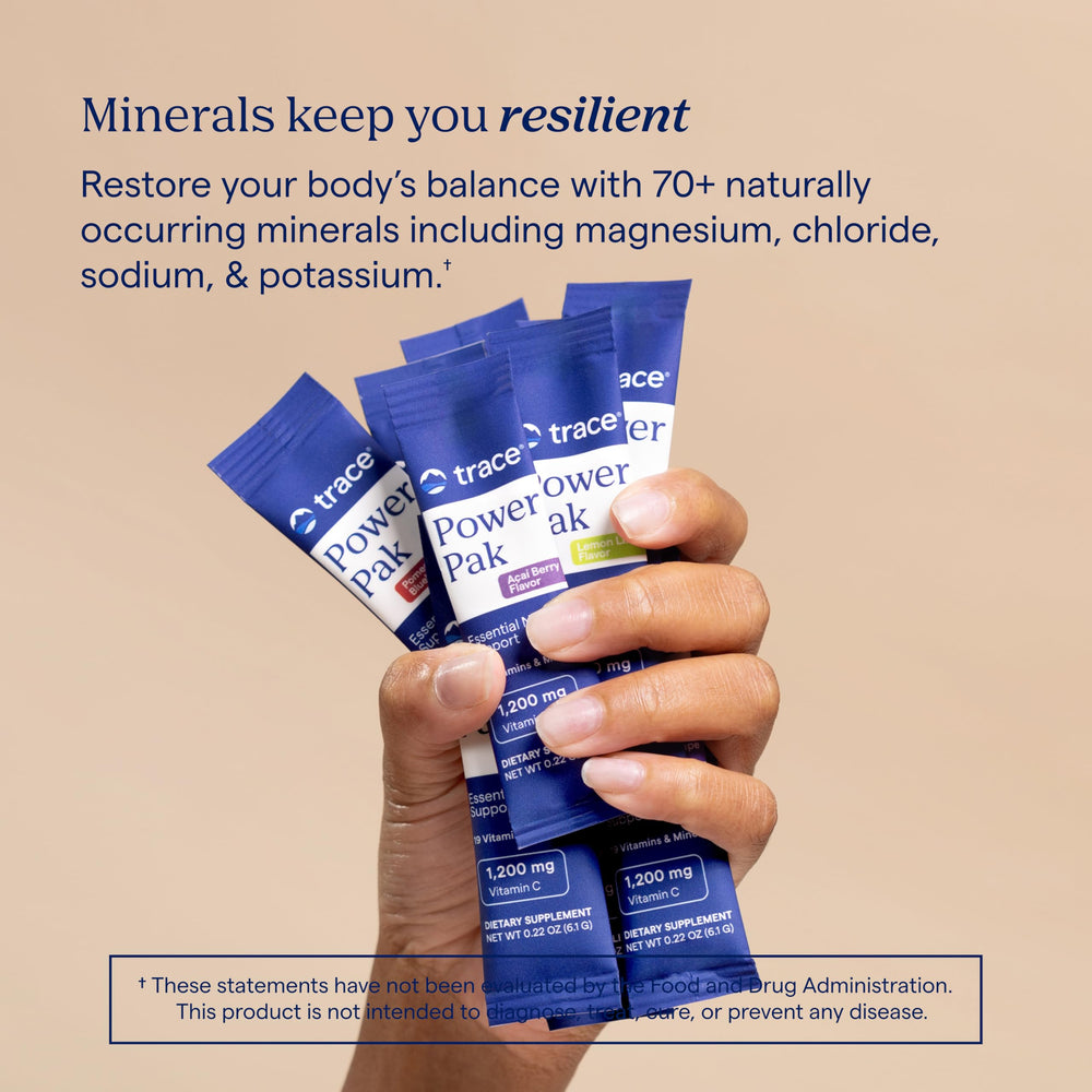Trace Minerals stick packet in hand for scale and easy-to-carry benefit
