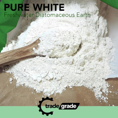 Trade Grade being sprinkled on soil demonstrating improved aeration and garden health benefit