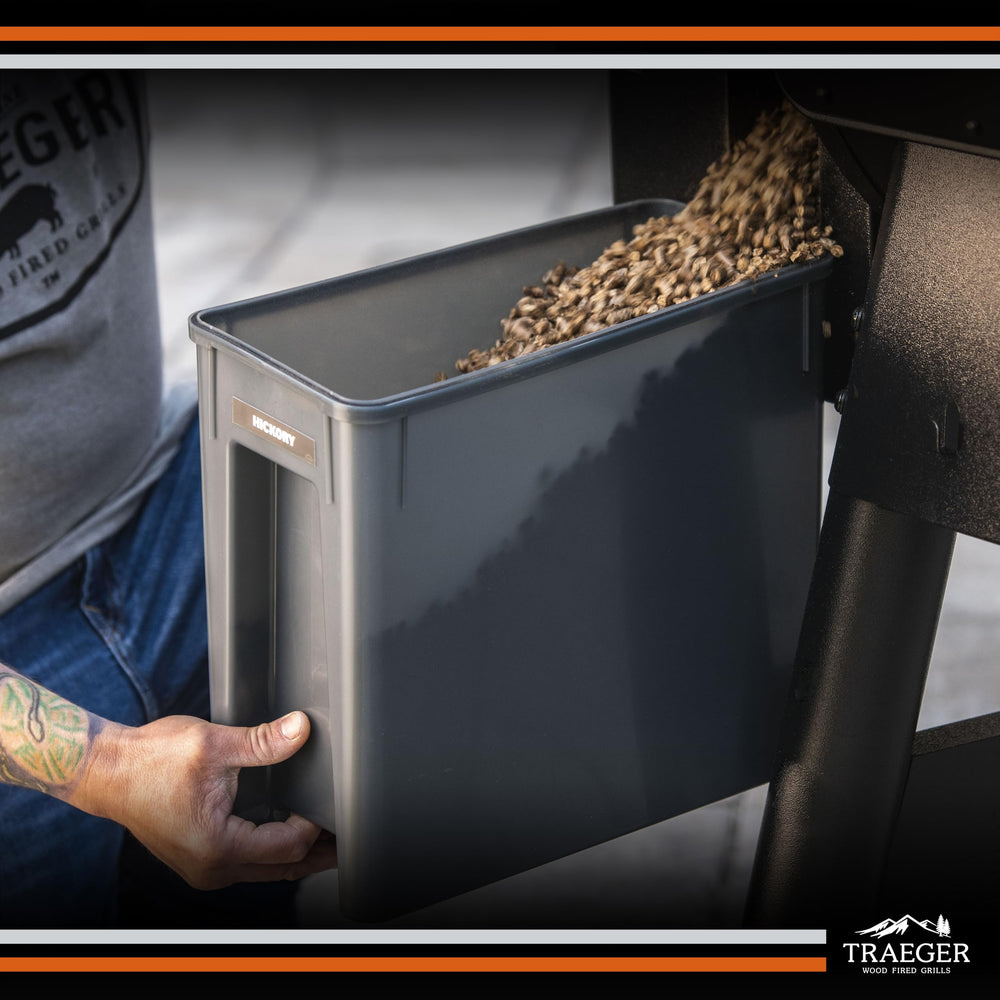 Traeger bin next to grill showing scale and easy reach during cookouts