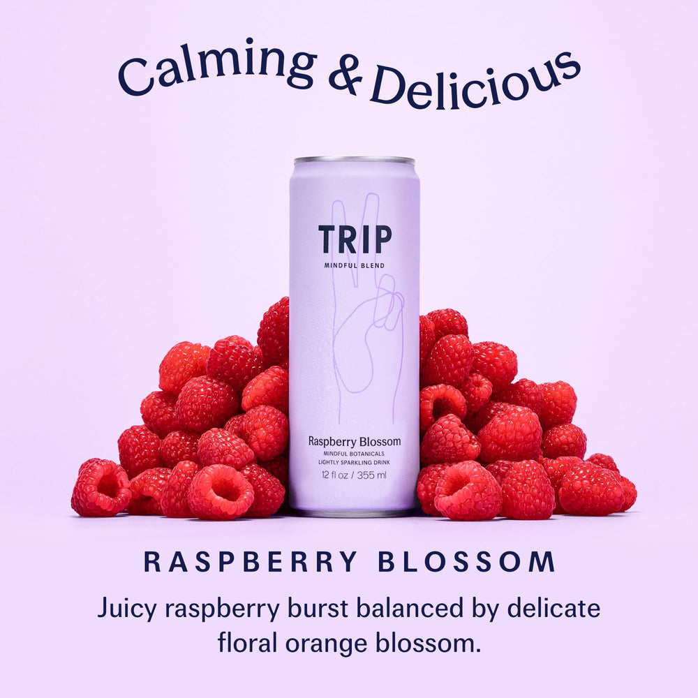 TRIP pouring Raspberry Blossom into glass for clean, chilled refreshment