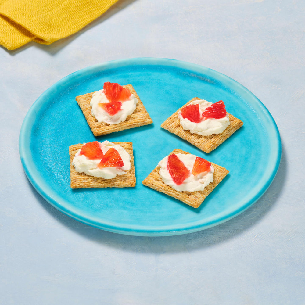 Triscuit crackers arranged on charcuterie board enhancing party presentation