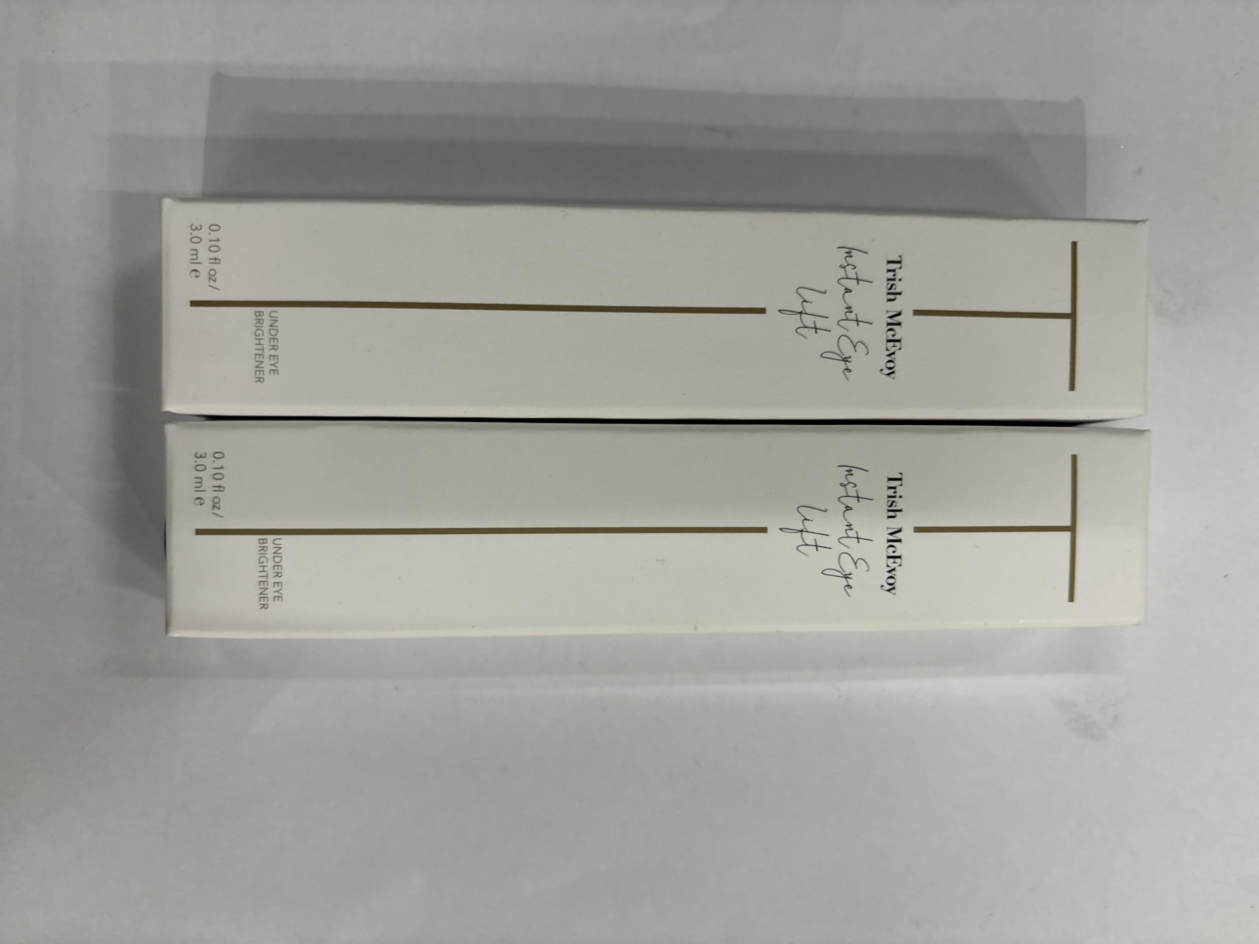 Trish McEvoy product staged with concealer showing layering compatibility