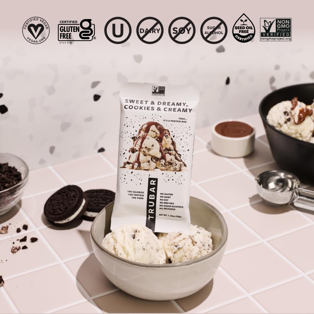 TRUBAR bar held in hand outdoors demonstrating convenient on-the-go snack
