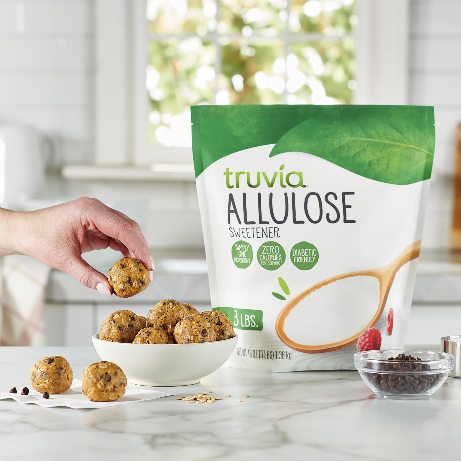 Truvia allulose dissolving in a steaming coffee mug, sweetens without added calories