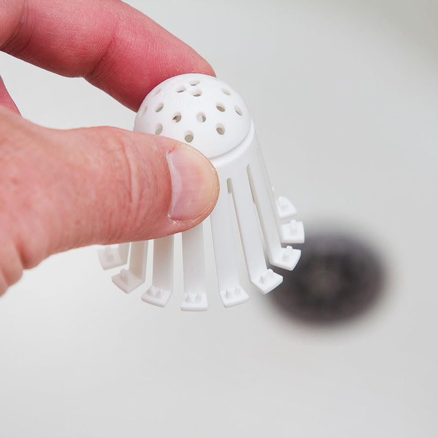 TubShroom Toss stack of strainers showing scale and one-year supply