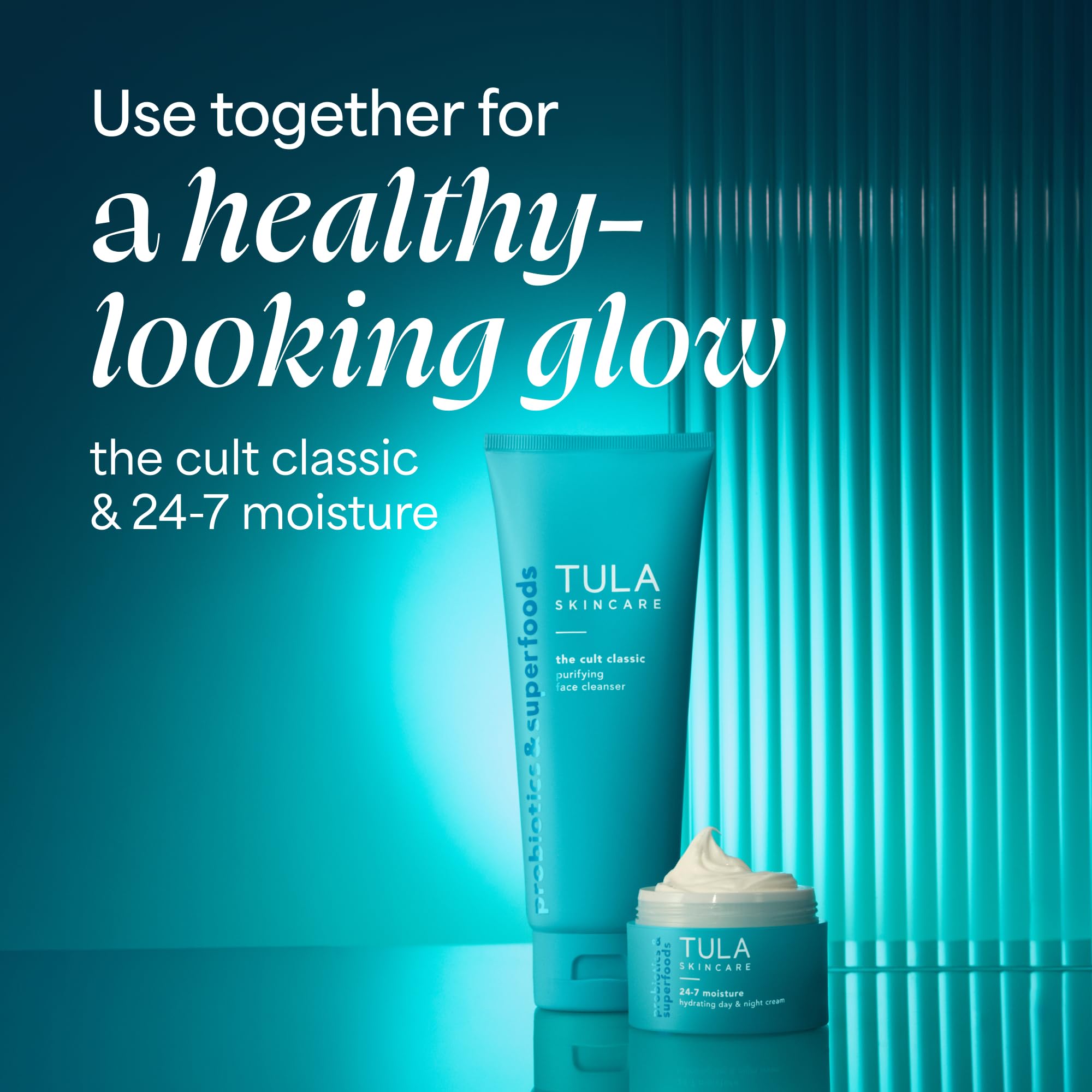 TULA cleanser beside turmeric root and botanicals showing natural support