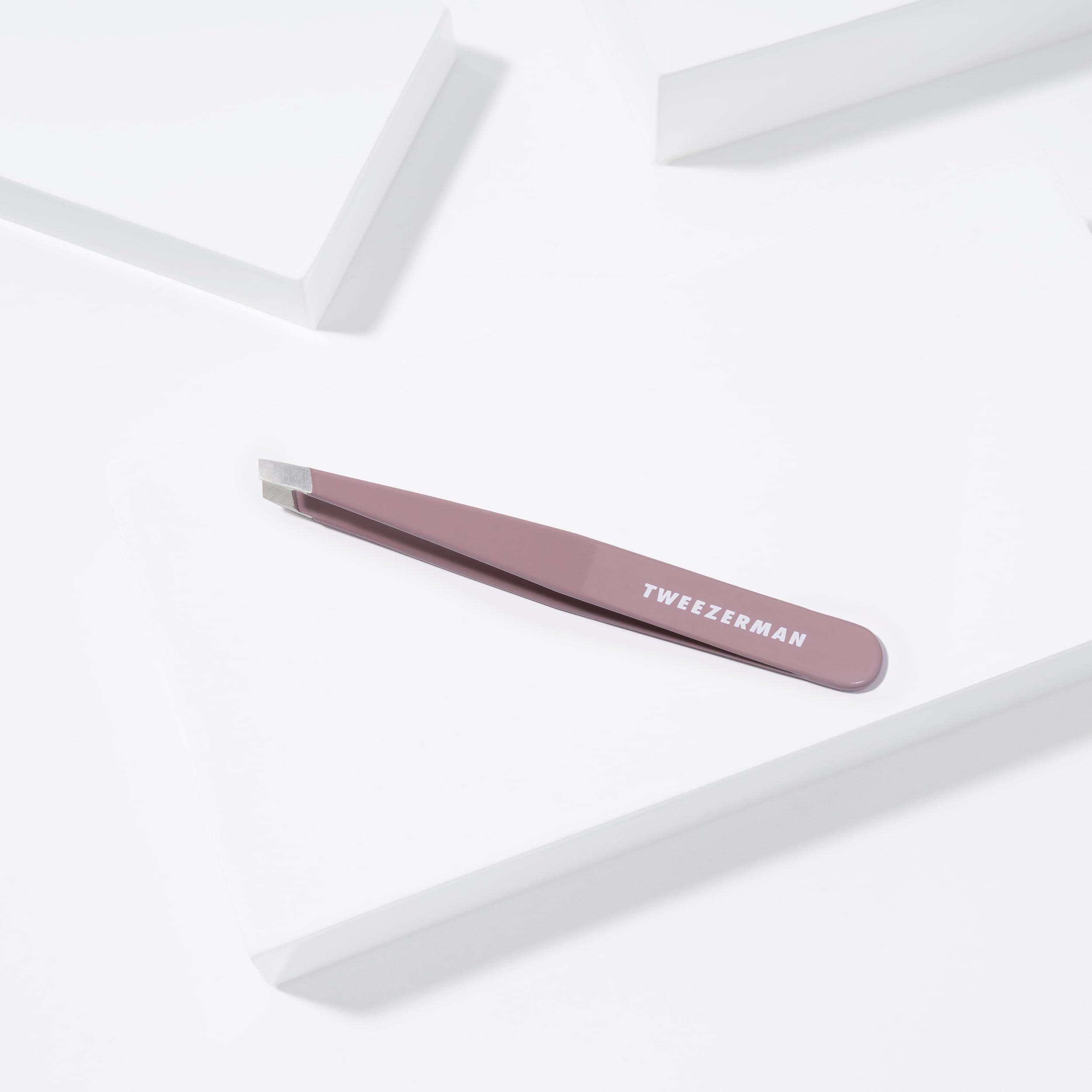 Tweezerman slant tweezer Purple Wisteria tip alignment detail showing perfectly matched hand-filed edges