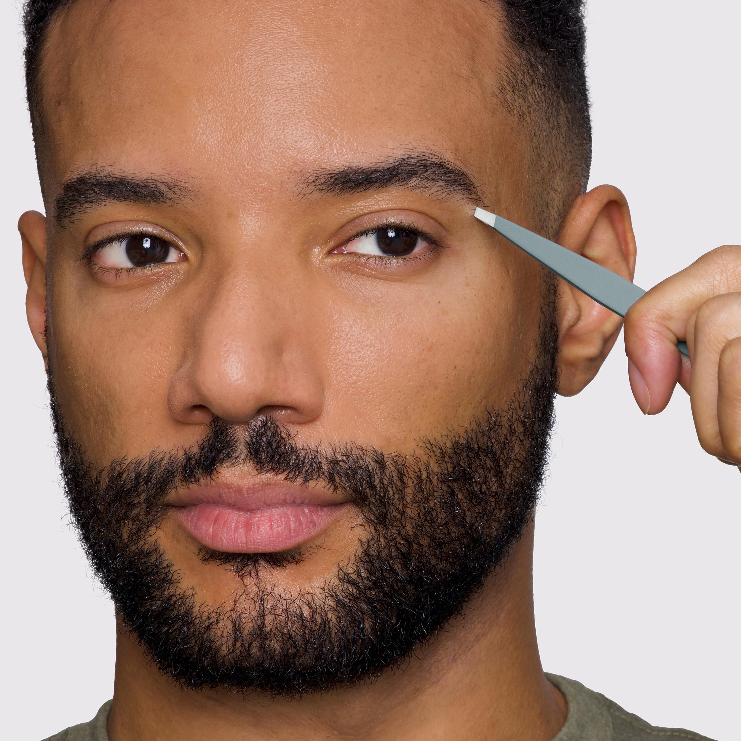 Tweezerman mist-blue textured finish offering comfortable non-slip hold