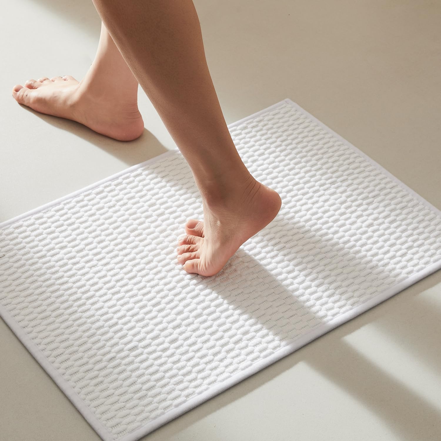 TYUU front packaging white 16x24 showing compact bath mat benefits